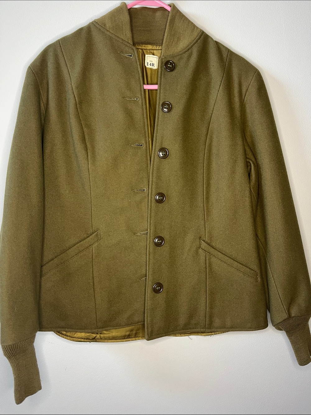 World War II-era U.S. Army M-1943 women's field jacket nurses uniform green wool